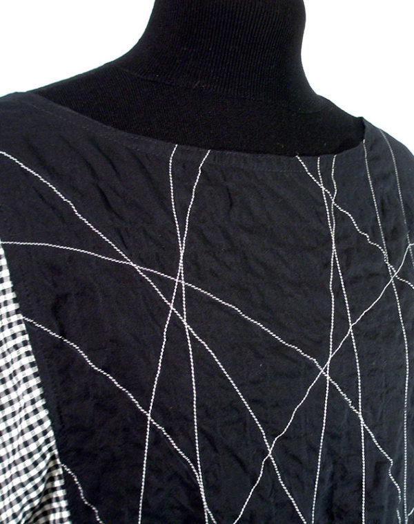 black-bw check caftan closeup of stitching