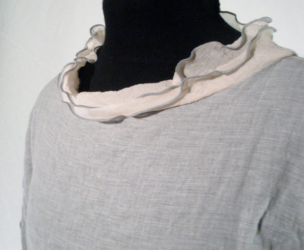 grey-pink tunic collar closeup view